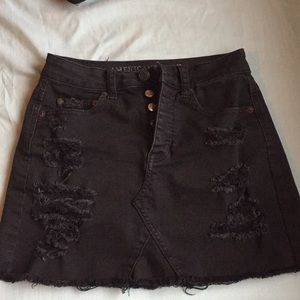Black distressed denim skirt